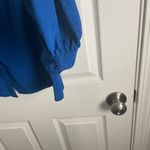 Charlotte Ford Blue Button Photo 3