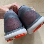 Nike  Woman’s Sz 8.5 Orange/Gray Sneakers Photo 3