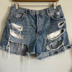 We The Free Free People |  Distressed Button Fly Denim Shorts. Size 30. Photo 1