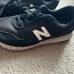 New Balance 311 Black and White Athletic Shoes Photo 1