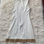 Bebe Ivory Asymmetrical Hem Gold Trim Dress Photo 3