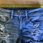American Eagle  Outfitters Midi Distressed Denim Shorts 0 Photo 3