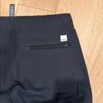 Vuori  Women’s ripstop charcoal pants size estimate small Photo 6