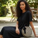 Mud Pie  brand cute as a button round weaved look casual bag. Photo 1