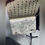 Silver crossbody purse with‎ silver chain and stud design Photo 2