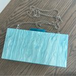 Anthropologie x Rae Of Light Acrylic Bow Clutch Box Bag in Blue and White Photo 2