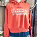 The North Face Emberglow Orange Never Stop Exploring Cropped Hooded Sweatshirt Photo 0