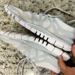 Nike Grey and White Athletic Sneakers Photo 1