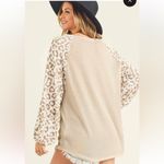 First Love Cream waffle knit long sleeve top with leopard print balloon sleeves Photo 1