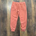 Vuori  Performance Joggers Rust Red Drawstring Pants Size Medium Photo 3