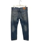 Levi's Levi’s 501 Button Fly Tapered Distressed Denim Jeans Photo 1