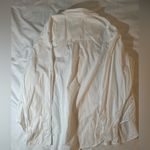 Elegant White Button Photo 3