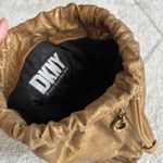 DKNY Vintage  Metallic Gold Leather Backpack Purse Drawstring Shoulder Bag Photo 1