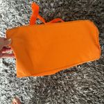 Baggallini  orange carry all nylon tote large with pink lining Photo 10