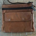Vintage leather lightweight crossbody bag. Great for travel. Brown Photo 1