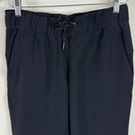 Lululemon  On The Fly Crop Woven Pants 23” in Black Size 6 Photo 8
