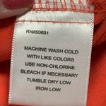 Grey's Anatomy V-Neck Short Sleeve scrub Top in Coral/orangish. Size Medium. Photo 10