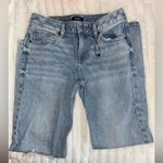 EXPRESS Light Wash Slight Distressed Jeans Photo 1
