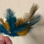Feather & Cross Hair Photo 1