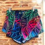 Camilla Running Short With Bike Pant
Under The Neon Sun Photo 1