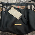 Burberry This is a  Little Crush crossbody bag in black leather and House check fabric.  Photo 0