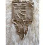 SKIMS  Seamless Sculpt Strapless Thong Bodysuit Clay  
Size Large Photo 6