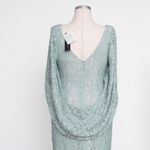 Betsy and Adam Betsy Adam - Caplet Cape-Sleeve Lace Gown Photo 9