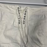 Free People we the free Crvy Super High Rise Lace Up super flare Jeans size 34 Photo 7