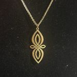 Elegant Gold Pendant Necklace infinity knot Photo 1