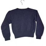 Liz Claiborne petite S or XS pearl bow on a dark blue merino wool sweater Photo 1