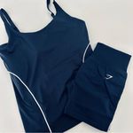 Gymshark  Contour Stitch Tank with Shelf & Lift Campus Seamless Shorts Set Photo 0