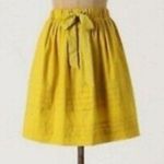 Anthropologie  Odille Drawing Parallels Pleated Pocket Skirt in Marigold Yellow Photo 4