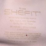 SheFit  sports bra size 4luxe Photo 6