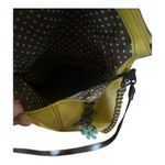 CHALA Mustard Pebbled Leather Crossbody Handbag with Dragonfly Charm. Photo 8