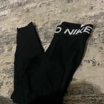 Nike  Black Mid Rise Crop Mesh Panel Leggings Size XS Photo 2