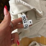 Tic Toc Cropped Zip Up Photo 4