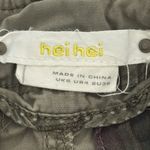 Women's Olive Cargo Shorts. Drawstring with button and zipper. Inseam 4” Size 4 Green Photo 6