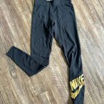Nike Black Leggings with Gold Logo Photo 0