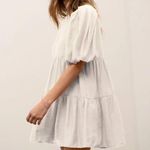 Moon River Bubble Sleeve Tiered Mini Dress in White Photo 1