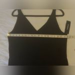 Bebe  Women's XL Black V-Neck Jumpsuit with Open Leg Slits Photo 9