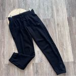 Aritzia TNA cozy fleece boyfriend Sweatpant in black Photo 1