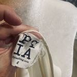 PPLA  Cream Sleeveless Dress with Ruffle Hem Photo 1