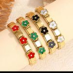 Elegant Gold and Black Flower Bracelet Photo 1