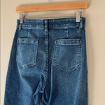 Faherty  Women's Stretch Terry Patch Pocket Flare Jeans in a dark blue wash 28 Photo 4