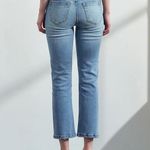 Muse Looks Distressed Mid Rise Slim Flared Classic Fit Mom light wash Jeans Blue Size undefined Photo 3