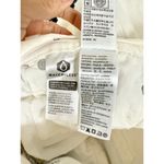 Levi's  High Waisted Slim Fit Denim Cut-Out Jean Short Chalk White Women's W28 Photo 3