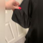 Alya  Oversized Flowy Black Top Photo 4