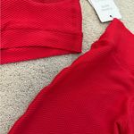 Bombshell sportswear Bombshell Leggings and Sports Bra Set- cross listed on Mercari! Photo 4