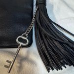 EXPRESS  key & tassle black crossbody purse Photo 1