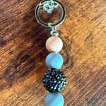Handmade Elegant Beaded Keychain with Silver Details Photo 0